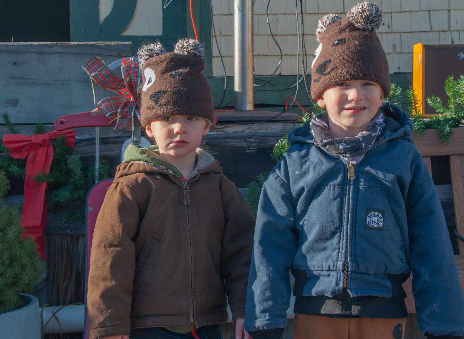 Wyatt, left; and Lincoln, three and four years old, had one eye on Dharma and the other on the hot chocolate stand at Dickens on the Delaware in Callicoon last Saturday. For more pics, follow the River Reporter on Facebook.